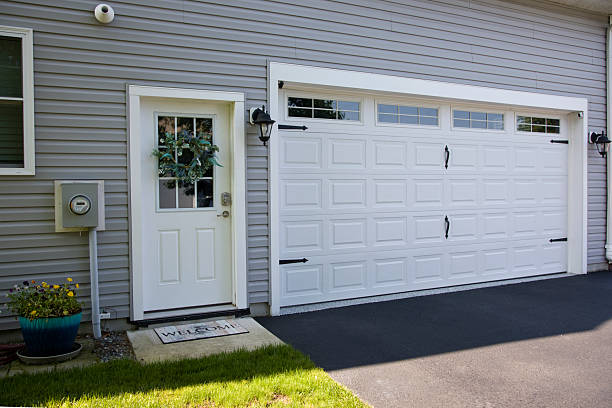 24/7 Emergency Garage Door Panel Replacement experts in Key Center, WA